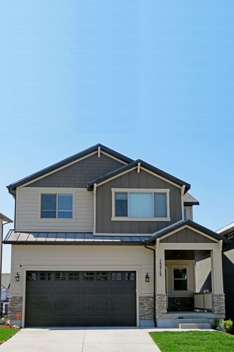 Craftsman style home with brown and beige siding Dark Bronze Metal Roof, Almond Windows, Brown Brick House Exterior Color Schemes, Bronze Metal Roof, Beige Exterior House Colors, Brown Brick House Exterior, Brick House Exterior Colors Schemes, Brown Roof Houses, Beige House Exterior