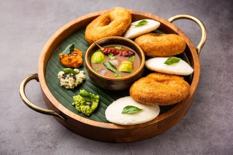 Idli vada with sambar pr sambhar also ca... | Premium Photo #Freepik #photo #dosa #masala-dosa #idly #sambar Medu Wada, Idli Vada, Sweet Pongal, Idli Sambar, Traditional Breakfast, Indian Breakfast, Authentic Recipes, Rice Cakes, South India