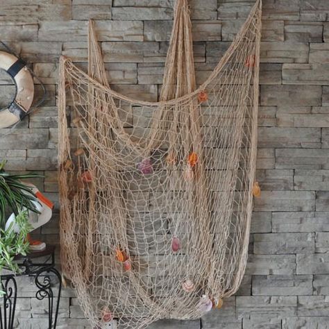 Fishing Net Wall Decor, Fish Net Decor, Decoration Buffet, Teak Shower Bench, Nautical Party Decorations, Mediterranean Interior, Beach Themed Party, Mediterranean Decor, Sea Shell Decor