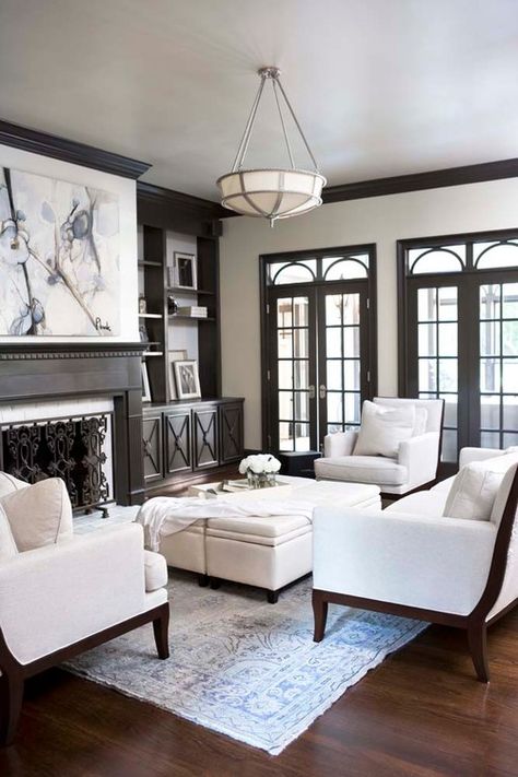 Remodelaholic | 25 Beautiful Examples of Colored Trim Living Room With Dark Wood Trim, Paint Colors Against Dark Wood, Wood Vs White Trim, Espresso Trim Interior, White Walls Dark Brown Trim, Dark Trim Living Room, Brown Trim White Walls, Dark Walls White Furniture, White Walls With Dark Trim