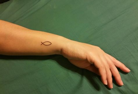 Christian Fish Symbol Tattoo, Christian Fish Tattoo For Women, Fish Simple Tattoo, Fish Wrist Tattoo, Fish Symbol Tattoo, Christian Tatoos Idea, Ichthys Tattoo, Simple Fish Tattoo, Small Fish Tattoo