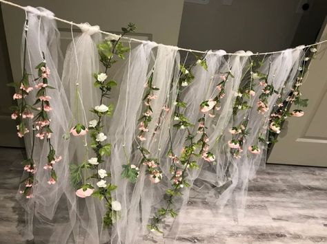 DIY Floral & Tulle Backdrop Party Curtain Backdrop Diy, Enchanted Forest Baby Shower Backdrop, Easy Floral Backdrop, Floral Prom Decor, Enchanted Forest Decorations Prom, Fairy Photo Backdrop, Tulle Curtains Diy, Fairy Photobooth, Enchanted Forest Prom Decorations