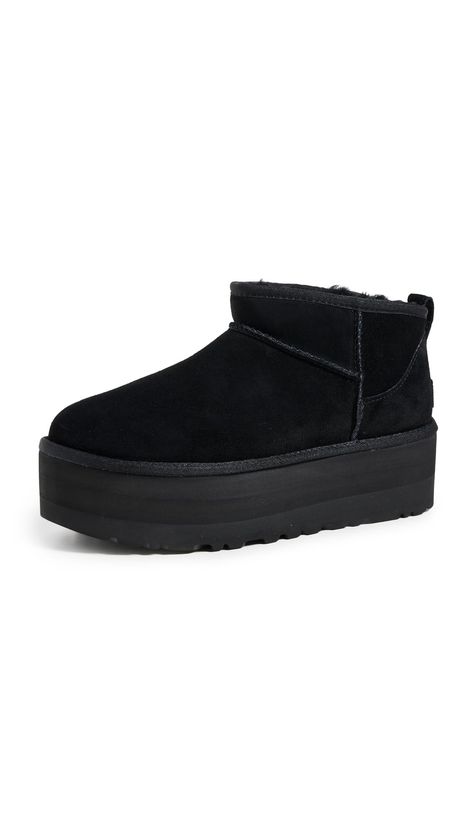 PRICES MAY VARY. Suede upper 17mm UGGplush wool lining 17mm UGGplush wool insole SugarSole EVA outsole 2" platform height Uggs Mini, Women's Winter Boots, Ugg Classic Ultra Mini, Luggage Brands, Black Uggs, Black Platform Boots, Ugg Classic, Classic Boots, Black Platform