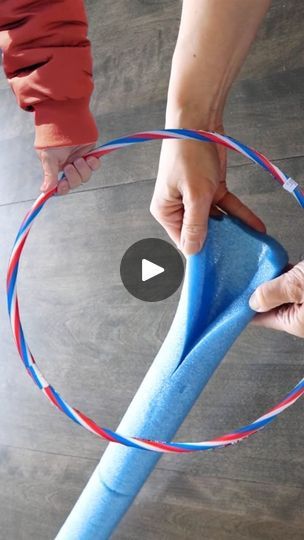 Dollar Store Pool Noodle Hula Hoop Hack | Stick a hula hoop into a pool noodle for this brilliant front porch idea! | By DIY with Hometalk | Grab a pool noodle and a hula
hoop for this front porch decoration. I'm going to use a
utility knife to slice the pool noodle vertically. This is
going to allow me to open up the pool noodle and slip it
around the hula hoop. I'm going to need about one and a
half noodles to cover this hula hoop. Now I'm going to grab
some duct tape and just secure the pieces together. Since this
is bright blue, I don't want it to show through my greenery. So
I'm going to grab some burlap ribbon and just wrap it around
the pool noodle. I can use a bit of hot glue as I go but
this should hold up pretty well. Now that this is all
covered in burlap, I've got these little Pool Noodle Tunnel Diy, Things To Make With Pool Noodles, Pool Noodle Crafts Decor, Pool Noodle Lollipop Diy, Pool Noodle Decorations, Christmas Pool Noodle Ideas, Pool Noodle Centerpiece Ideas, Diy Pool Noodle Crafts, Pool Noodle Flower Arrangement