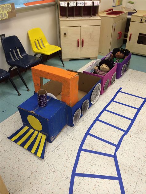 Train made out of card board boxes in my dramatic play center  #train Train Provocations, Train Preschool Theme, Train Ideas For Preschool, Ground Transportation Crafts Preschool, Train Dramatic Play Preschool, Transportation Theme Dramatic Play, Transportation Theme Preschool Dramatic Play, Train Dramatic Play, Bus Dramatic Play