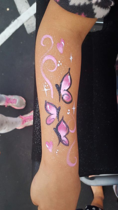 Face Painting Designs Butterfly, Simple Face Painting Ideas Butterfly, Pink Butterfly Face Paint, Flower And Butterfly Face Paint, Butterflies Face Paint, Flower Face Paint On Arm, Butterfly Facepainting Ideas, Face Paint Arm Art, Arm Face Painting Easy