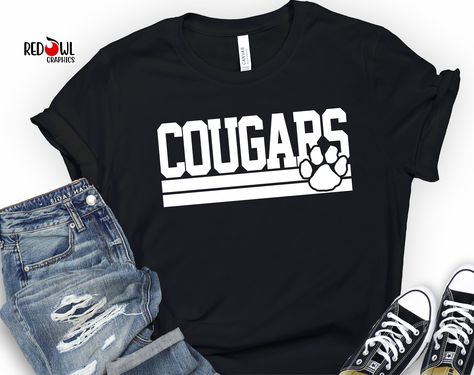 Personalized Cougar School Spirit T-Shirt Crewneck, Hoodie Hooded Sweatshirt Football, Baseball, Basketball, Softball, Track, Volleyball, Cross Country, Cheer, Wrestling Not all colors are available in all sizes and styles.  Please check the color and size charts in photos. We do our best to accurately represent shirt colors by using actual photos but do understand that all monitors will display differently. Please contact us prior to purchase with any questions on sizing or colors. Your purchas Cougars Spirit Shirts, Elementary School Sweatshirts Designs, Cougar Shirt Design, Middle School Cheer Shirts, Retro School Spirit Shirts, Elementary Spirit Shirts, High School Sweatshirts, School Sweatshirts Designs, School Spirit Shirt Ideas