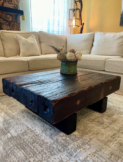 36"L x 27"W x 12"H (Ask for a custom size) Introducing our Napa Valley Coffee Table, handcrafted from naturally cracked reclaimed redwood lumbers that embody farmhouse style. Through a Japanese blowtorching process known as Shou Sugi Ban, this centerpiece was given its weathered look for a strong rustic appeal. Railroad Tie Coffee Table, Wood Beam Coffee Table, Industrial Farmhouse Coffee Table, Diy Rustic Coffee Table, Modern Rustic Coffee Table, Unique Coffee Table Ideas, Rustic Square Coffee Table, Wood Dinner Table, Barnwood Coffee Table