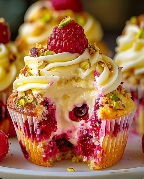 Pistachio Raspberry Cheesecake Cupcakes Recipe Raspberry Pistachio Cupcakes, Raspberry Cheesecake Cupcakes, Cheesecake Cupcakes Recipe, Pistachio Raspberry, Pistachio Cupcakes, Honey Muffins, White Chocolate Cupcakes, Pistachio Cheesecake, Bakery Items