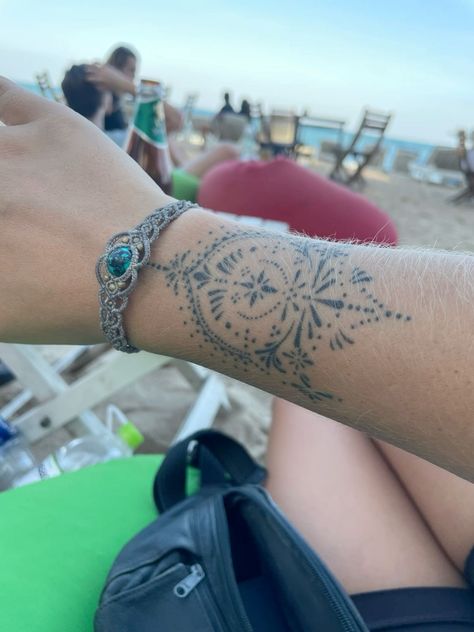 Wrist And Arm Tattoos, Women Bracelet Tattoo, Front Of Shin Tattoos For Women, Blue Ink Tattoo Healed, Light Hand Tattoos, Hip Tattoos Women Symmetrical, Ornamental Arm Band Tattoo, Ankle To Foot Tattoos For Women, Ornamental Wrist Cuff Tattoo