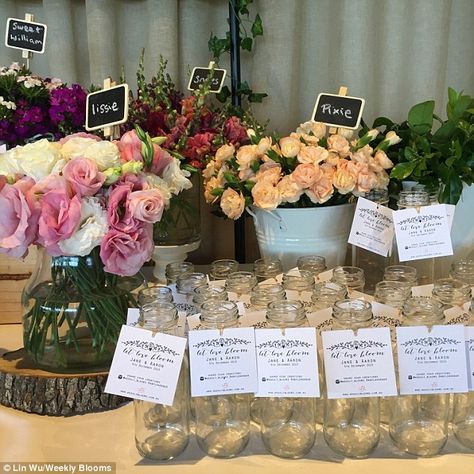 'Same concept as candy bar': Ms Wu said that flower bar pop ups at weddings allow for gues... Flower Bar For Party, Bridal Shower Centerpieces For Long Tables, Diy Flower Bouquet Station, Flower Bar Favors, Bridal Shower Flower Bar Ideas, Fresh Flower Bar, Make And Take Flower Bar, Wedding Flower Bar, Flower Bar Wedding Favor