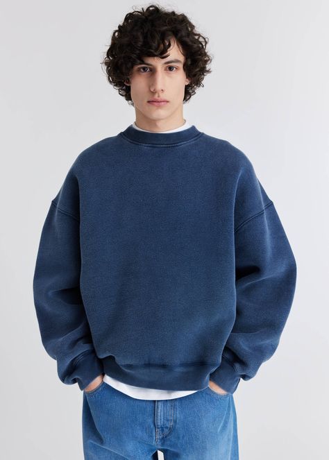 Cut from organic cotton, the oversized Typo sweatshirt is crafted using an old-dye technique to achieve a vintage look. Embroidered letters across the back spell out ‘Axel’. Mens Outfits Sweatshirt, Navy Sweatshirt Outfit Men, Oversized Sweatshirt Outfit Men, Mens Crewneck Outfit, Crewneck Sweatshirt Outfit Men, Granola Boy Aesthetic Outfits, Crew Neck Sweatshirt Outfit Men, Navy Sweatshirt Outfit, Crewneck And Jeans