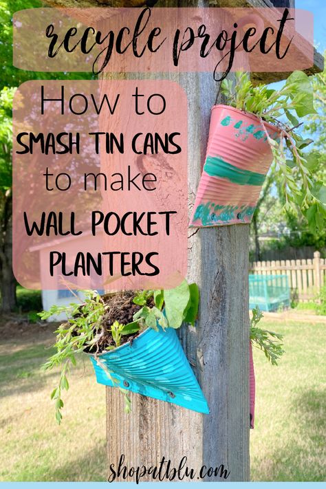 smash tin cans, upcycle trash, recycle, earth day project, tin can wall pocket planters Hanging Tin Can Planters, Upcycle Tin Cans Garden, Vegetable Can Crafts, Paint Planters Diy, Tin Can Pockets Diy, Tin Can Wall Pocket Diy, Smash Can Craft, Smashed Cans Diy, Repurposed Items For Garden