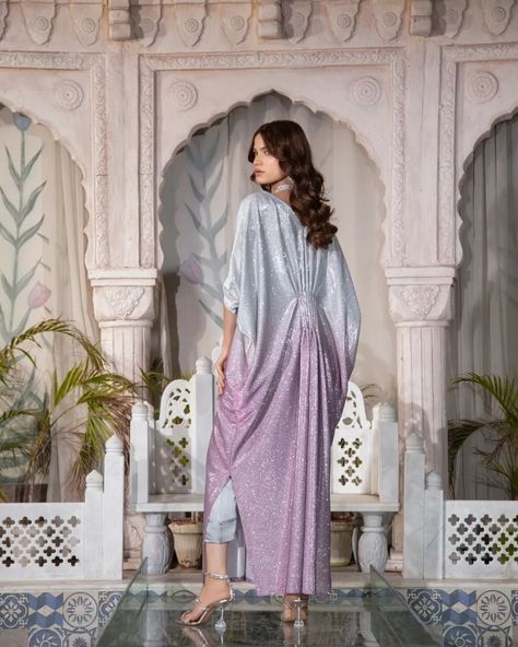 The MOONLIGHT - 2 Piece Kaftan is a must-have for any formal occasion. With its blingy design and sequence fabric, this kaftan is perfect for adding a touch of glamour to your evening look. Plus, it's perfect for night photography, making it a versatile and stylish choice. Fabric: Moonlight Includes: Kaftan and trousers  Length: 52"-53" Model's height: 5'8 ***PLACE YOUR PRE-ORDERS BY 29TH MARCH 2024 FOR GUARANTEED DELIVERY BY EID*** #readytowear #Pakistaniwedding #Pakistanibride #Moder... Shirts Designs Pakistani, Sequence Fabric, Pink Kaftan, Evening Look, Simple Pakistani Dresses, Beautiful Dress Designs, Modest Wear, March 2024, Pakistani Outfits