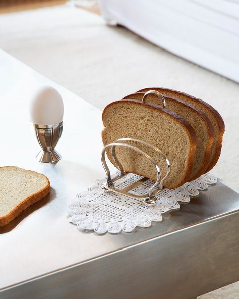 A ritual not to be missed. Gohar Old World introduces a collection of Breakfast in Bed objects from the past, repurposed to make every day special. Bean-shaped toast racks, egg cruets, and silver platters that never go out of style – shop the collection, online now at @gohar.world. Ph @rheak. Toast Holder, Silver Platters, Toast Rack, Breakfast In Bed, Sacred Space, Old World, Exterior Design, Vintage Sterling Silver, Ritual