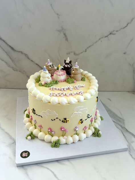 Yellow vintage cake with buttercream clouds, flowers, and animals sitting around a mini cake Animal Buttercream Cake, Cute Animal Cake Ideas, Cute Cat Cakes, Critter Cake Ideas, Cute Fondant Cakes, Cat Cake Design, Buttercream Clouds, Buttercream Animals, Yellow Vintage Cake