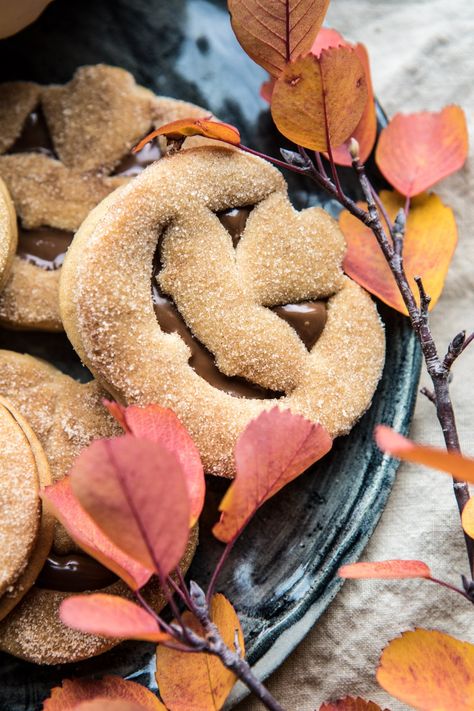 Milk Chocolate Stuffed Jack-O'-Lantern Cookies | halfbakedharvest.com #halloween #thanksgiving #cookies #easyrecipes #chocolate #holidayrecipes #fallrecipes Jack O Lantern Cookies, Elegant Thanksgiving, Sweet Milk, Brown Sugar Cookies, Biscuit Recipes, Halloween Cupcake, Thanksgiving Cookies, Filled Cookies, Chocolate Day