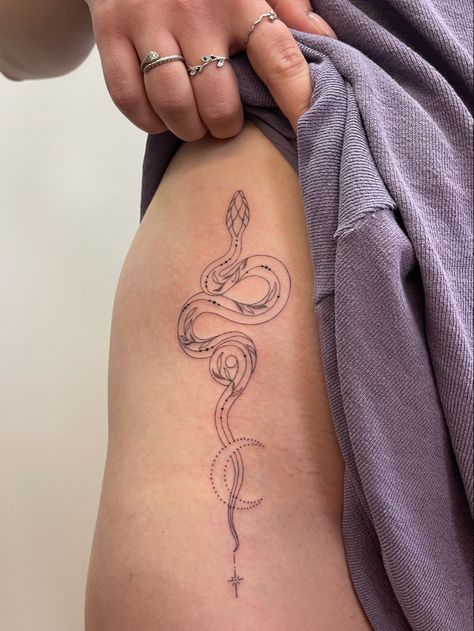 Fineline snake tattoo Snakes And Vines Tattoo, Snake Nature Tattoo, Pretty Snake Tattoos For Women, Wrap Around Wrist Tattoos Snake, Dainty Snake Spine Tattoo, Snake Tattoo On Stomach For Women, Year Of Snake Tattoo, Snake Leaves Tattoo, Snake On Ribs Tattoo