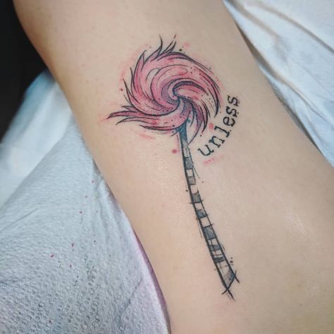 25 Delightful Dr. Seuss Tattoos That Bring the Nostalgia | "Don't cry because it's over. Smile because it happened," Dr. Seuss is credited with coining. Was he talking about tattoos? Lifestyle Truffula Trees Tattoo, Unless Tattoo Dr. Seuss, Truffula Tree Tattoo, Dr Seuss Tattoo Ideas, Unless Tattoo, Lorax Tattoos, Dr Seuss Tattoo, Disney Tattoos Unique, Life Symbol Tattoo