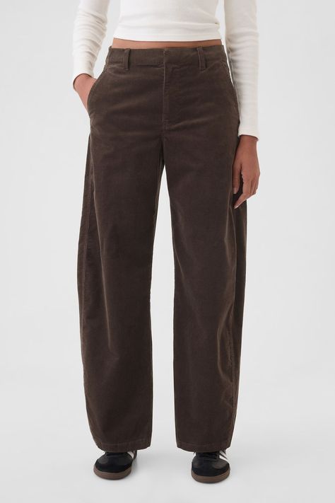 Soft corduroy tapered trousers. E-waist with concealed hook and bar closure zip fly. Front slant pockets back welt pockets. 98% Cotton, 2% Elastane. Easy Silhouette, Brown Trousers, Sportswear Leggings, Tapered Trousers, Leather Trousers, Jogger Jeans, Fit Inspo, Toddler Dress, Tops For Leggings