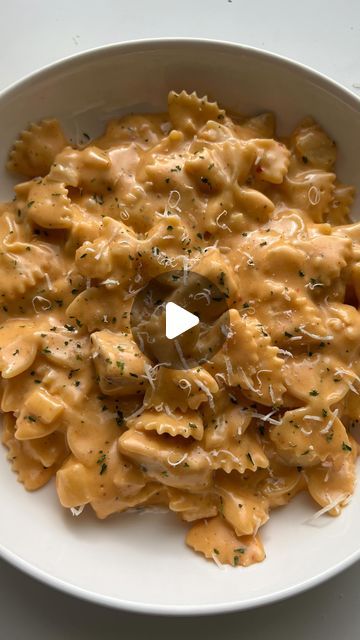 2.4M views · 476K likes | Angela Miley on Instagram: "FarFALLIN for this pasta 🍝 Cheesy Buffalo Chicken with Farfalle aka Bowtie Pasta 😋 RECIPE ⬇️ 

1. Cook 1/2 lb pasta in salted water until al dente.
2. Add olive oil to a pan and 2 chicken breasts cut into bite sized pieces. Season your chicken. 
3. When the chicken is cooked, remove from the pan (optional: mix chicken with Buffalo sauce) then add 3 tbsp of butter.
4. Add 3 cloves minced garlic and 1/2 a diced onion. Cook for a few minutes. 
5. Add 1.5 cups heavy cream. When simmering, lower the heat. Season your sauce. 
6. Add 1/4 cup Asiago, 1/2 cup cheddar and 1/2 cup mozzarella.
7. Add pasta water & mix until creamy. Add 1/2 cup Buffalo sauce. 
8. Add your cooked pasta & chicken to your sauce. Enjoy! #thesecarbsdontcount" Chicken With Buffalo Sauce, Farfalle Pasta Recipes, Farfalle Recipes, Cheesy Buffalo Chicken, Bow Tie Pasta Recipe, Pieces Season, Buffalo Chicken Pasta, Farfalle Pasta, Pasta Chicken