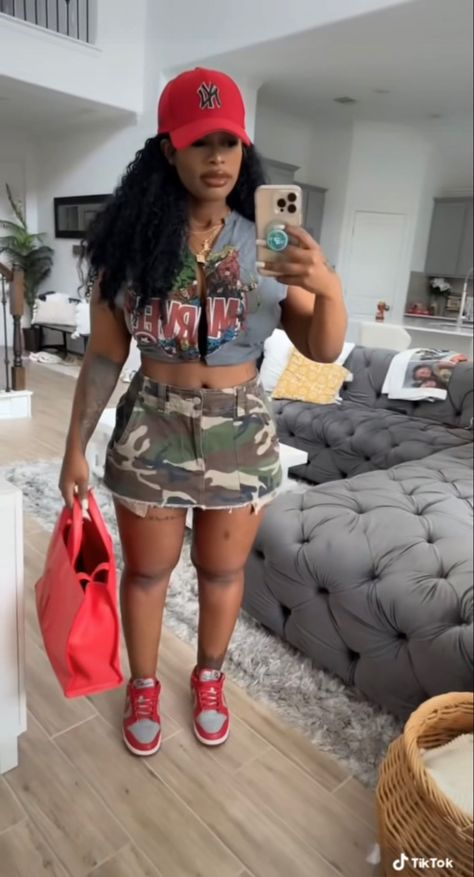 Camo And Red Outfit Women, Shorts Concert Outfit Ideas, Graphic Tee Dress Outfit Black Women, Army Shorts Outfit Black Women, Camouflage Skirt Outfit Black Women, Camo Shorts Outfit Women Summer, Camo Shorts Outfit Black Women, Baseball Game Outfit Black Women, Bowling Outfit Black Women