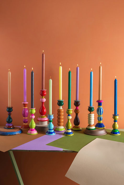 Our collection of bright tones candle holders have been beautifully hand painted in a carnival of vibrant colours. Wood has been expertly carved into wonderful curvy, fluid shapes create effortlessly elegant candle holders fit for any table and any occasion. Pair designs, mix and match, grouped or individual, these candle holders are sure to add a little joy to your décor. Painted Wooden Candle Holders, Burnt Orange Living Room, Ian Snow, Diy Candle Sticks, Fluid Shapes, Elegant Candle Holders, Painting Candle Holders, Elegant Candle, Wooden Candle