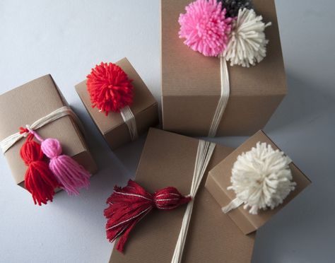 Yarn_Gift_Wrapping Wrapping With Yarn, Yarn Pom Poms, Xmas Gift Wrap, Holiday Gift Wrapping, Tassel Crafts, Princeton Nj, Yarn Gifts, Gift Wrapping Ideas, How To Make A Pom Pom