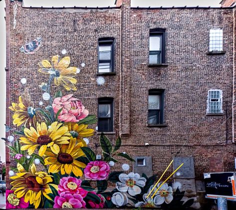 A mural located in Chicago. Click to get the address. Brick Mural, Chicago Murals, Chicago Brick, Garden Fence Art, Creative Wall Painting, Flower Mural, Fence Art, Flower Bookmark, Park Photos