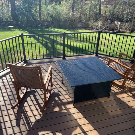 Relaxation awaits with Trex Toasted Sand decking overlooking the backyard in Simpsonville, SC. Complete with Trex Signature Railing on this amazing deck by Exterior Escapes LLC! Call us today to get your backyard paradise started at 864-248-6462! Trex Signature Railing, Trex Deck Coastal Bluff, Trex Deck Toasted Sand, Toasted Sand Trex Decking, Trex Toasted Sand Decking, Trex Toasted Sand, Deck Outdoor Living, Living In Charlotte Nc, Trex Deck Colors