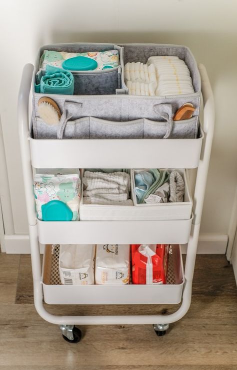 These nursery organization ideas for small spaces are amazing! Try these easy DIY storage hacks. You’ll be organizing your baby supplies like a pro. You have to see this three tier utility cart, it’s perfect for storing diapers, wipes, and all the baby essentials. #joyfullygrowingblog #organization #baby #nursery Uppfostra Barn, Perlengkapan Bayi Diy, Storage Hacks Diy, Baby Nursery Organization, Baby Nursery Diy, Baby Nursery Inspiration, Baby Room Organization, Baby Storage, Baby Life Hacks