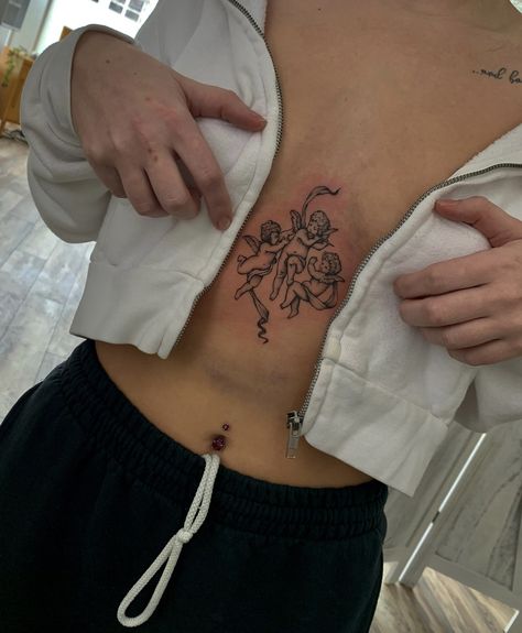 716 Tattoo, Angel Sternum Tattoo, Three Angels Tattoo, Under Bum Tattoo, Small Sternum Tattoo Women, Chest Tattoo Designs Female, Mens Body Tattoos, Cherub Tattoo, Torso Tattoos