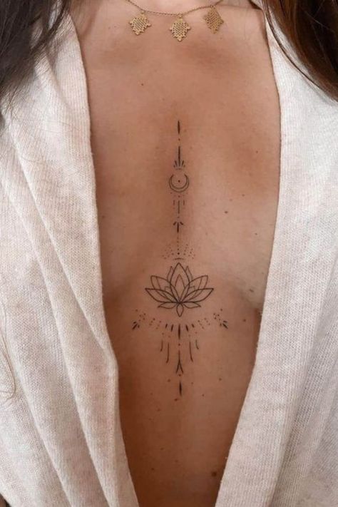 Discover a curated collection of 65+ underboob tattoos, ranging from subtle artistry to bold masterpieces. Explore the fusion of elegance and expression, and get inspired for your next ink. Perfect for those seeking unique tattoo ideas! Im Sure Were Taller In Another Dimension Tattoo, Tattoo For Bff, Delicate Sternum Tattoo Women, Tiny Sternum Tattoo, Lotus Flower Sternum Tattoo, Women Chest Tattoo Classy, Simple Sternum Tattoo Women, Under Breast Tattoos For Women, Small Sternum Tattoo