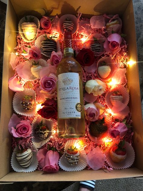 Chocolate covered strawberries, Wine & twinkle lights Roses $30 DIY Valentines Day Strawberries, Wine Gift Box Ideas, Valentine Chocolate Covered Strawberries, Colour Meaning, Valentine Strawberries, Strawberry Box, Wine Gift Box, Chocolate Covered Strawberries Bouquet, Liquor Gifts