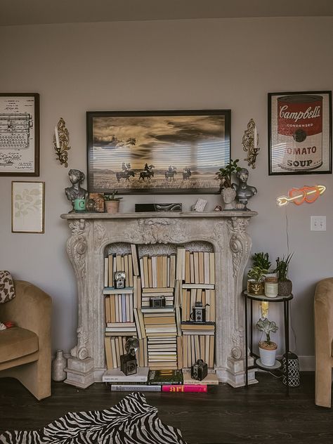 Old Books In Fireplace, Books Over Fireplace, Books In A Fireplace, Mantle With Books, Faux Vintage Fireplace, Fireplace Decor Aesthetic, Fireplace Book Storage, Fireplace Filled With Books, Fun Fireplace Ideas