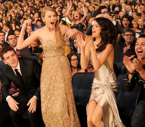 That year, Taylor won for favorite female country artist, favorite country album (Speak Now), and artist of the year.                  Source: Getty / Jeff Kravitz/AMA2011 Taylor Swift With Friends, Surprise Face, Grammys Red Carpet, Selena And Taylor, Selena Gomez Cute, Selena Gomez Pictures, Girls Together, Speak Now, Mtv Videos