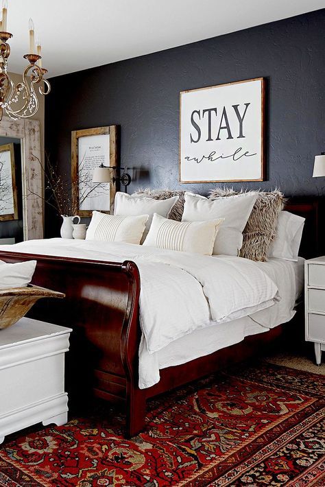 Whether you're working with a hand-me-down family heirloom or a vintage piece you scored for a bargain, decorating with wood furniture is all about achieving a balance. Use these tips on how to decorate with wood furniture to style old pieces with an updated look. #howtodecoratewithwoodfurniture #thrifted #fleamarketfinds #bedroomdecor #bhg Wood Furniture Bedroom Decor, Cherry Wood Bedroom, Wood Bedroom Decor, Dark Wood Bedroom Furniture, Cherry Bedroom Furniture, Cherry Bedroom, Dark Wood Bedroom, Dark Wood Bed, Brown Furniture Bedroom