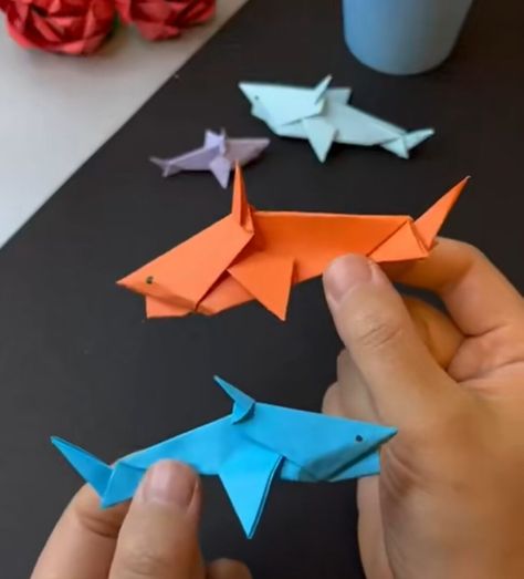 simple origami shark Shark Origami Easy, Shark Decorations Diy, Shark Origami, Paper Shark, Origami Shark, Easy Origami Tutorial, Shark Craft, Simple Origami, Origami Tutorial Easy