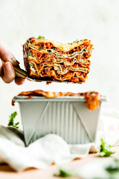 A small batch lasagna recipe, perfectly portioned for 2! Assembled in a loaf pan, this Lasagna for Two boasts beautiful layers of al dente pasta, rich & hearty Italian sausage meat sauce, & creamy spinach ricotta cheese. This easy mini lasagna is perfect for date night, Valentine’s Day, or whenever you don’t feel like prepping a giant pan of lasagna! Make-Ahead & Freezer-Friendly. #lasagnarecipe #lasagnafortwo #loafpanlasagna #smallbatchdinner #fortworecipes #pastarecipes #... Small Batch Lasagna, Sausage Meat Sauce, Loaf Pan Lasagna, Lasagna For Two, Sausage And Peppers Pasta, Mini Lasagna, Carb Loading, Sausage Sauce, Sausage Meat