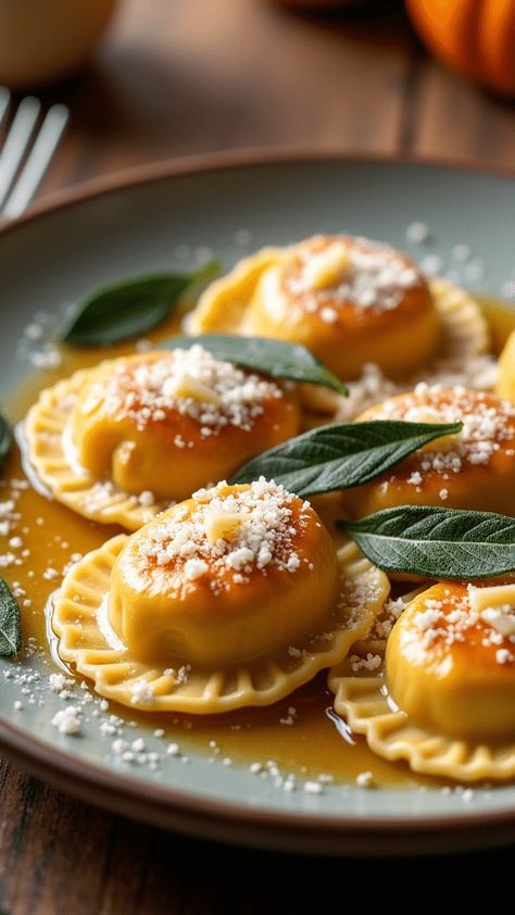 Pumpkin Ravioli with Sage Brown Butter Dinner Hosting, Halloween Cooking, Sage Brown Butter, Pumpkin Dinner, Asparagus Dishes, Pumpkin Ravioli, Ravioli Bake, Brown Butter Sauce, Homemade Ravioli