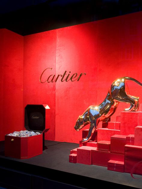 What's the saying ... diamonds are a panther's best friend?! For this luxurious window display, we created a fibre glass sculpted panther making quiet movements towards a red chest of sparling diamonds - #windowdisplay #retaildesign #cartier #visualinspiration #highstreet #luxury Luxury Window Display, Tiger Canvas Art, Gala Decorations, Cartier Panther, Attention Getters, Clothing Store Interior, Jewelry Store Design, Store Design Boutique, Visual Merchandising Displays