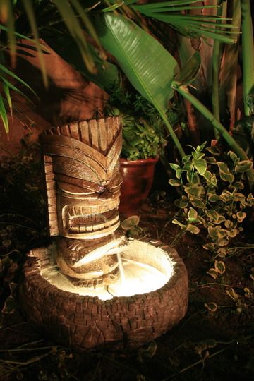 tiki fountain - Google Search Tiki Fountain, Outdoor Tiki Bar, Backyard Pool Parties, Backyard Party Decorations, Ideas For Backyard, Diy Outdoor Bar, Tiki Statues, Tiki Bars, Tiki Decor