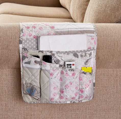 PRICES MAY VARY. 100% Polyester ORGANIZER WITH UNIQUE DESIGN: Grey Angel, Pink Floral, and Butterfly patchwork patterns, with double diamond quilting, graceful, charming and unique. Keep your accessories organized and protect your couch armrest against mess. Pets friendly. Made to enhance decor. DURABLE AND COMFORTABLE: Premium quality of quilted microfiber with extra soft fill, reverse to a white silicone puppy paw dots pattern, slip resistant and ECO friendly. Made to last. The silicone slip r Patchwork Couch, Rose Patchwork, Pride Diy, Bedside Caddy, Patchwork Sofa, Homemade Bags, Storage Sofa, Diy Tableware, Candles Fragrance