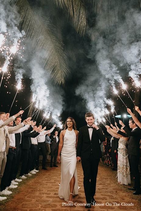 Bride and groom entry, Groom tux, bridal white gown inspiration, bridal gown, white gown for the bride, couple entry for wedding, bride and groom entry, unique couple entries, couple photoshoot, wedding photoshoot, wedding photography, couple portrait, reception inspiration, wedding inspiration Entry For Wedding, Bridal White Gown, Bride And Groom Indian Wedding Outfit, Bride And Groom Entry, White Ball Gown Wedding Dress, Groom Indian Wedding Outfits, Gown Traditional, Couple Entry, Groom Entry