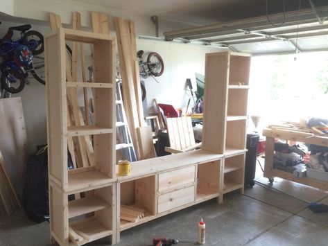 Diy Entertainment Center With Bookshelves, How To Build A Entertainment Center, Large Wall Unit Entertainment Center, Farmhouse Entertainment Center Diy, Bookshelf Entertainment Center Diy, Diy Bookshelf Entertainment Center, 2x4 Entertainment Center, Homemade Entertainment Center, Diy Entertainment Center Plans