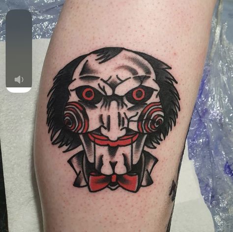 Jigsaw Traditional Tattoo, Billy Jigsaw Tattoo, Trad Horror Tattoo, Superbad Tattoo, Scary Traditional Tattoo, Billy The Puppet Tattoo, American Traditional Horror Tattoo, Gogo Tattoo, Saw Tattoo Jigsaw