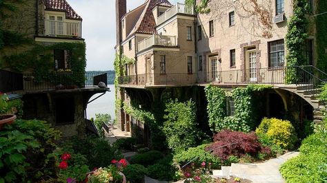 Perched atop a cliffside in the Bronx overlooking the Palisades sits one of the most charming residences within New York City: Villa Charlotte Bronte. It was designed, and has survived, as a pastoral escape from the hustle and bustle of the city. Nyc Trip Planning, Walking Nyc, Nyc Spots, Character Homes, Places In New York, Office Tower, Grand Central Station, Victorian Mansions, Charlotte Bronte