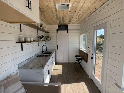 This 20' converted shipping container is a perfect off-grid tiny home customized for the unique tiny home enthusiast! A perfect conversion takes an old container right into a unique studio home that is ideal for living off drig! Shipping Container Studio, Unique Tiny Home, Container Home Interior, Converted Shipping Containers, Shipping Container Conversions, Shipping Container Cabin, Container Conversions, Storage Container Homes, Container Cabin