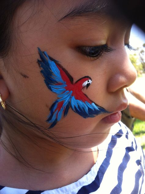 Parrot face paint... bird... colourful... Gabbas Face Painting Parrot Face Painting, Animals Face Painting, Bird Face Painting, Face Painting Easy Simple, Parrot Face Paint, Halloween Cheek Face Paint, Jungle Face Paint, Animal Face Paint Ideas For Kids, Kid Face Paint Ideas