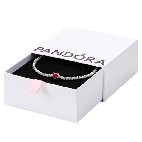 PRICES MAY VARY. This beautiful Pandora piece of jewelry makes a simple, sophisticated statement With Pandora jewerly pieces create an elegant, cohesive jewelry look This exquisite piece of Pandora jewelry is the perfect gift for her, no matter the occasion Give a voice to your loves and experiences through unique, hand-crafted jewelry Go for timeless style with a pop of colour with the Red Sparkling Heart Tennis Bracelet. One heart-shaped red man-made crystal forms the center of this sterling s Heart Tennis Bracelet, Pandora Red, Pandora Collection, Red Gift Box, Artificial Stone, Crafted Jewelry, Pandora Bracelet, Crystal Gifts, Perfect Gift For Her